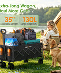 Extra Long 35 Inch Collapsible Wagon loaded with gear beside a woman and dog at a campsite