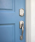 Camelot Trim Lower Half Front Entry Handleset With Avila Lever In Satin Nickel For A Dope Front Door Setup installed on blue door