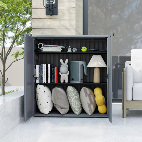 Beefy Outdoor Storage Cabinet With Doors And Shelf Grey Weatherproof HDPE Resin Box for patio or garden, shown open with items inside.
