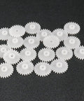 20 Piece Plastic Worm Gear Set 24 Teeth Model 242A Reduction Gear For RC Cars Robots and Micro Motors on black background