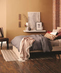 Cozy bedroom featuring warm lighting from Relax LED Indoor Floodlight Bulb Four Pack 8W Equivalent To 65W Soft White HD Light.