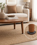 Self Adhesive Furniture Sliders For Carpet And Hardwood Floors 2 Inch Diameter under coffee table leg on woven rug.
