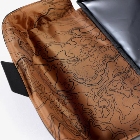 Interior view of Trasher Vehicle Trash Can For Cars And Trucks, showcasing rugged design and waterproof lining.