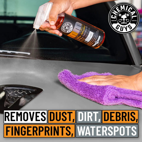 Meticulous Matte Detailer And Spray Sealant For Crisp Satin And Matte Finishes Safe For OEM Vinyl And Painted Matte Surfaces 32 Fl Oz Easy Spray Application Non Greasy Matte Coating Streak Free Protection For Your Daily Driver shown being applied to a car hood with a purple towel