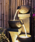 Four Bowl Outdoor Water Fountain With LED Lights Modern Polyresin Floor Fountain for garden with cascading water bowls at night