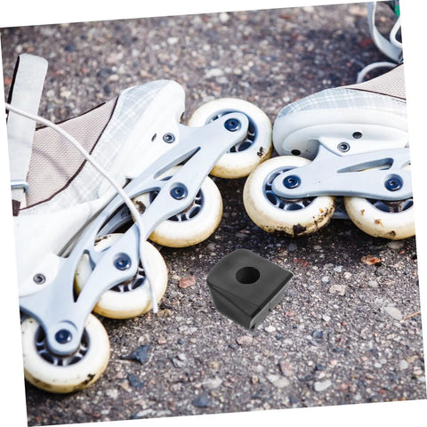 Roller Skate Brake Stoppers For Inline And Quad Skates Durable Toe Stops next to inline skates on pavement