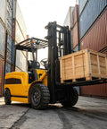 Heavy Duty Electric Forklift Stacker For No Sweat Warehouse Pallet Moving And Heavy Cargo Hauling, lifting wooden crate in container area.