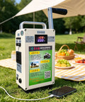 Hand Crank Emergency Power Generator Portable 150W Power Supply next to picnic setup outdoors