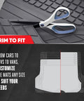 Built Tough Heavy Duty Trimmable Cargo Mat Liner with scissors showing trim-to-fit feature for customizing size in classic black.