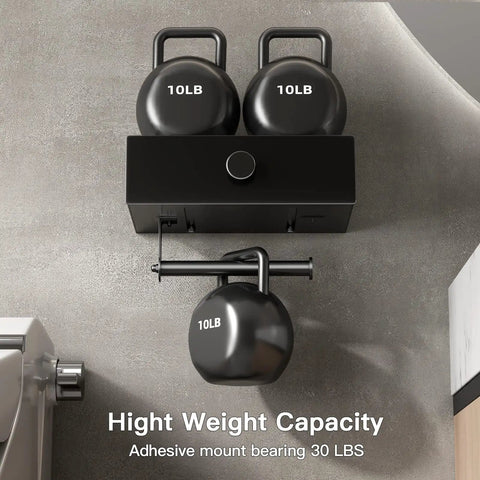 Black Toilet Paper Holder With Shelf And Drawer Storage, holding 10lb weights to demonstrate strength and adhesive mount capacity.
