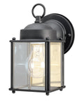 One Light Exterior Wall Lantern With Textured Black Steel Finish And Clear Glass Panels For Outdoor Use Solid And Built To Last Extends Five And Three Quarters Inches Uses One Medium Base Bulb 100W Max Weatherproof With Five Year Warranty.