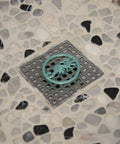 Disposable Hair Stopper For Shower, Sink, And Tub - Hygienic No-Touch Hair Cleanup, Ocean White And Teal on drain cover
