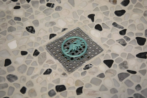 Disposable Hair Stopper For Shower, Sink, And Tub - Hygienic No-Touch Hair Cleanup, Ocean White And Teal on drain cover