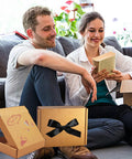 Two Heavy Duty 5X4X1 Small Shipping Boxes 50 Pack, Legit Corrugated Cardboard Mailers in use, surrounded by unpackaged items.