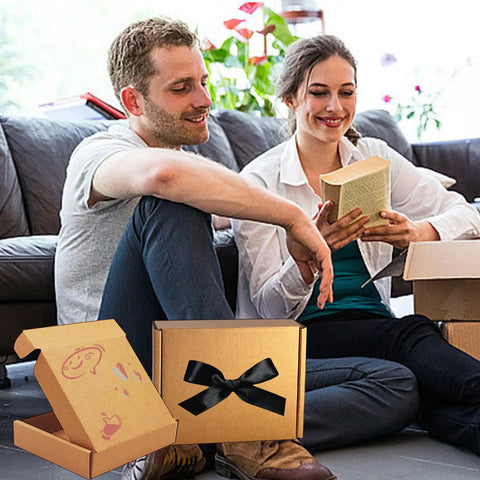 Two Heavy Duty 5X4X1 Small Shipping Boxes 50 Pack, Legit Corrugated Cardboard Mailers in use, surrounded by unpackaged items.