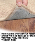 No Slip Rug Grippers Kit With 16 Large Double Sided Carpet Tape Strips, Reusable And Easy To Remove, showing adhesive under rug