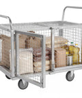 Heavy Duty Platform Truck With Secure Wire Cage Haul Cart filled with bags and bottles, featuring smooth roll swivel wheels.