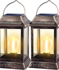 Retro Bronze Metal Solar Lanterns Outdoor Lights Pack Of 2, glowing LED filament bulbs, vintage metal finish and solar panels.