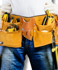 Man wearing Premium Leather Tool Belt For Men Heavy Duty Adjustable Carpenter Belt Fits 33 To 48 Inch Waist Pouch with tools