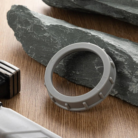 50 Pack 2 Inch Gray Plastic Conduit Bushings Heavy Duty Insulating Sleeves on wooden surface with tools and rocks.