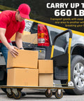 Heavy Duty Foldable Push Cart Dolly With 660 Lb Capacity loaded with boxes beside a vehicle