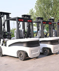 Heavy Duty Electric Stacker Forklift For Busy Warehouses Compact Pallet Lifter side view showing multiple units lined up outdoors.