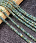 Dope Natural Stone Cylinder Beads For Crafting Sick DIY Jewelry, Legit Hand Polished Loose Spacer Gems 2x6mm on a flat surface.