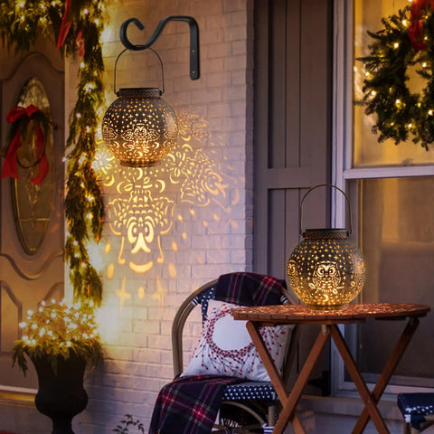 Outdoor Solar Lanterns With Cute Owl Cutouts Two Pack Waterproof Garden Decor casting owl-shaped light on wall