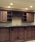 Modern kitchen with wooden bar cabinetry featuring a wine rack and wall-mounted Score Instant Hot Water With This Beast-Mode 26.9 KW Electric Tankless Water Heater.