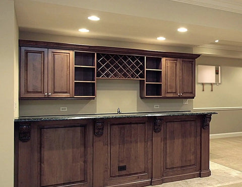 Modern kitchen with wooden bar cabinetry featuring a wine rack and wall-mounted Score Instant Hot Water With This Beast-Mode 26.9 KW Electric Tankless Water Heater.