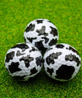 Cow Print Golf Balls 360 Degree Full Wrap Color Set For Gifts Tournaments And Keepsakes 12 Pack Novelty Balls on Grass