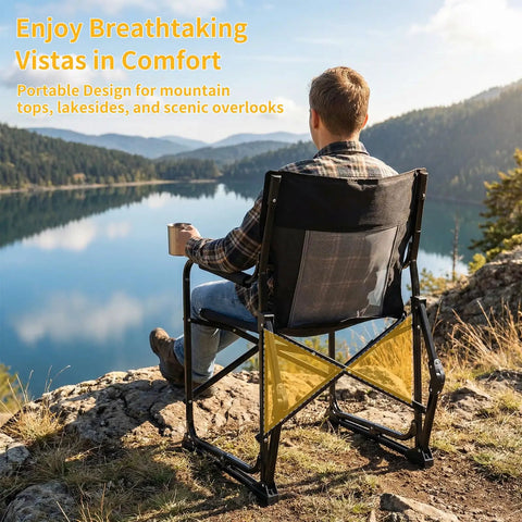 Person sitting in Folding Rocking Chair For Adults With Breathable Mesh Back Detachable Waterproof Armrests And Cup Holder Portable Outdoor Camping And Lawn Seat Black Comfy Rocker For Travel And Garden overlooking lake