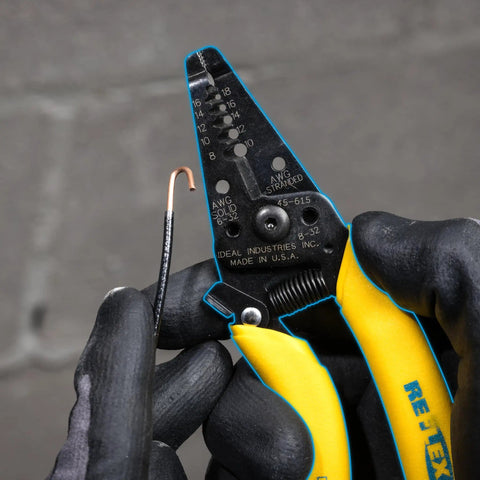 Gloved hands using Wire Stripper Tool For 8-16 Solid And 10-18 Stranded Wire With Precision Stripping Holes on a copper wire