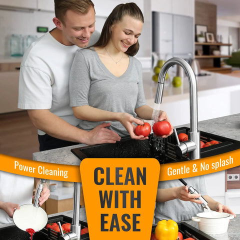 Couple using Pull Down Kitchen Faucet With Brushed Nickel Finish, Single Handle High Arc Swan Neck for washing vegetables