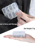 Camera Screw Set AAK2326 26 Pcs compact storage case held in hand, demonstrating portability and lightweight design.