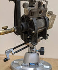 Multi Purpose Work Center With Self Centering Jaws 9 Inch Opening, showing a mounted mechanism on a heavy duty base.