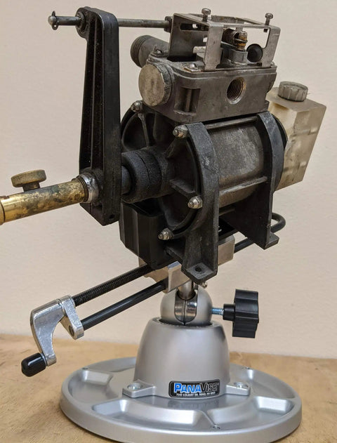 Multi Purpose Work Center With Self Centering Jaws 9 Inch Opening, showing a mounted mechanism on a heavy duty base.