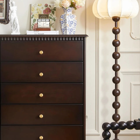 Dark wood dresser with 8 Pack Round Solid Brass Cabinet Knobs And Drawer Pulls Dope Gold Finish 1 Inch Diameter Premium Polished Hardware.