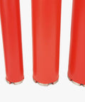 Red diamond wet core drill bits set, side view; 1–4 in sizes with 1-1/4 in threaded shanks.