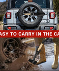 28 Inch Mini Garden Shovel With D Grip Handle For Car Emergencies And Everyday Use on SUV tire, used in muddy terrain.