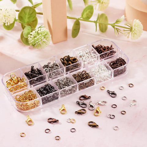 Image of Six Color Jewelry Finding Kit With 5mm Open Jump Rings And 12x6mm Lobster Claw Clasps for DIY necklace making, in storage box.