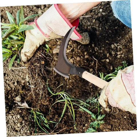 Person using Lightweight Manganese Steel Garden Weeding Tool With Portable Double Edged Sickle for easy weeding.