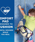Child rock climbing with Go To Adhesive Bandages Variety Pack For Minor Cuts Scrapes And Burns, Keeps Dirt And Germs Out visible on arm