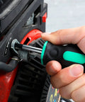 Using the Stubby 4 Piece Tool Set With Hammer Flat And Phillips Screwdrivers And Adjustable Wrench In Turquoise Lightweight Durable Steel With Soft Grip Handles Great For Quick DIY Fixes At Home And On The Go Phillips screwdriver
