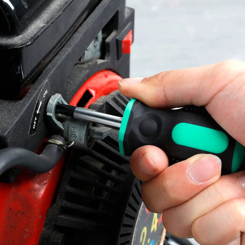 Using the Stubby 4 Piece Tool Set With Hammer Flat And Phillips Screwdrivers And Adjustable Wrench In Turquoise Lightweight Durable Steel With Soft Grip Handles Great For Quick DIY Fixes At Home And On The Go Phillips screwdriver