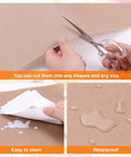 Nonstick Teflon Sheets For Heat Press 12 Inch By 8 Foot PTFE Roll shown being cut, easy to clean, waterproof, for DIY and iron-on transfers.