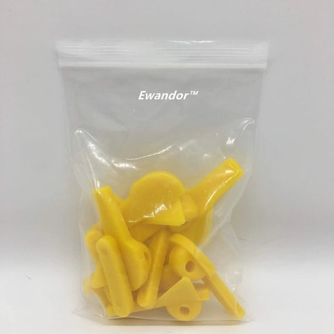 Pro Grade Tire Changer Nylon Insert Kit for Duck Head Mount Demount Tools in clear bag, yellow nylon pieces.