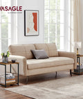 Living room with a beige sofa and set of two industrial style end tables with rustic brown tops and matte black steel frames.