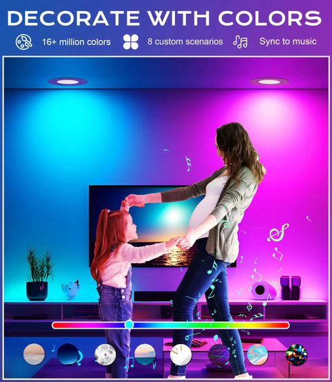 Mother and daughter dancing in living room under color-changing 4 Pack 6 Inch Gimbal Smart WiFi LED Recessed Lights RGBCW Color Changing.