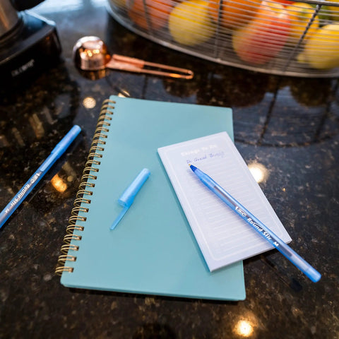 60 Count Blue Ballpoint Pens With Ultra Long Lasting Ink, Translucent Barrel on notebook and paper, smooth 1.0mm point